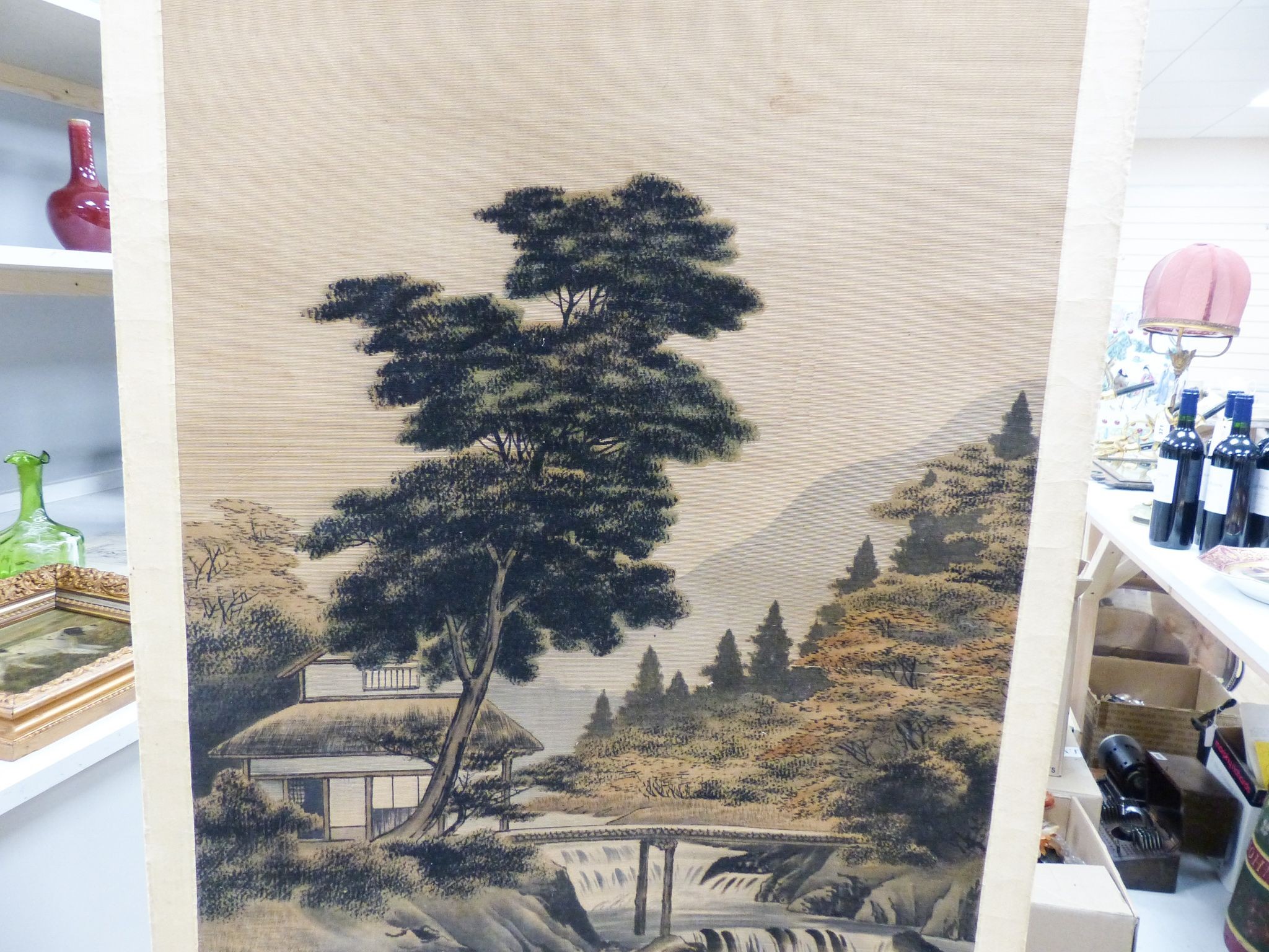 An early 20th century Japanese painted felt and watercolour landscape scroll